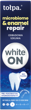 Tołpa White ON Microbiome & Enamel Repair pasta do zębów w granatowym opakowaniu, z napisem 'white ON', bez fluoru.