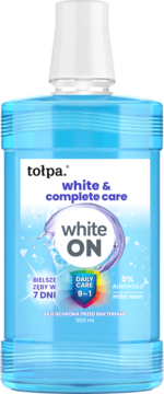 Tołpa White ON, 500ml, wybielający płyn do ust bez alkoholu, w niebieskiej butelce z białą nakrętką, widok z przodu.