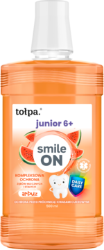 Tolpa junior 6+ płyn do płukania ust arbuz, ochrona przed próchnicą, pomarańczowa butelka, widok z przodu.
