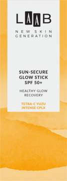 Białe opakowanie sztyftu AA LAAB Sun-Secure Glow Stick SPF 50+ Tetra-C Yuzu, na pomarańczowym tle.
