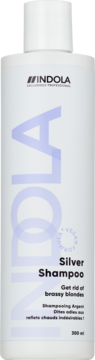 Biała butelka szamponu Indola Silver Shampoo, 300ml, widok z przodu. Neutralizuje miedziane tony blond włosów, formuła wegańska.