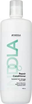 Indola Repair Conditioner w białej butelce 1000 ml, widok z przodu, zielony napis, informacja "Vegan Formula".