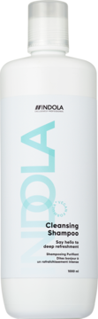 Indola Cleansing Shampoo w białej butelce 1000 ml, z jasnoniebieskim napisem Indola. Widok z przodu.