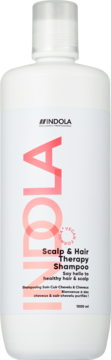 Indola Scalp & Hair Therapy Shampoo w białej butelce z różowym logo INDOLA i napisem Vegan Formula, widok z przodu.