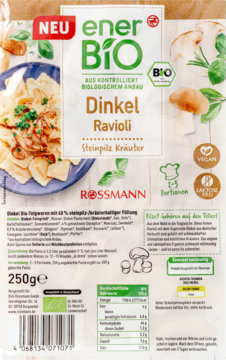 Front opakowania enerBIO Dinkel Ravioli Steinpilz Kräuter, 250g, z gotowymi ravioli i pieczarkami.