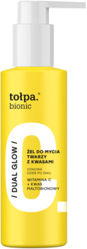 Żel Tołpa Bionic Dual Glow, żółta butelka z białą pompką, do mycia twarzy z kwasami, widok z przodu.