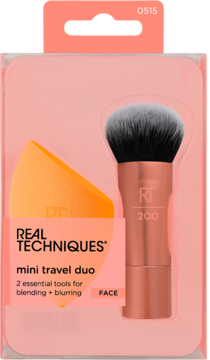 Real Techniques mini travel duo: orange blending sponge and face brush in peach packaging, frontal view.