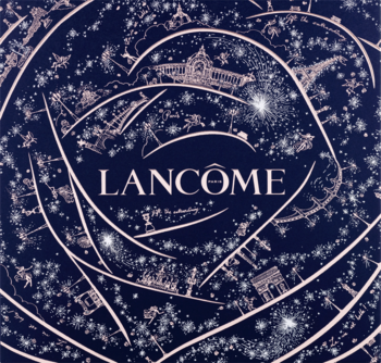 Zestaw Lancôme Idôle w granatowym opakowaniu z białym logo, gwiazdami i zarysami paryskich zabytków.