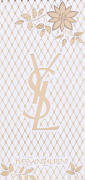 Biało-złote, pionowe opakowanie zestawu makijażowego YSL z centralnym logo i subtelnymi kwiatami.