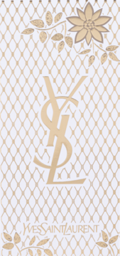 Złote logo YSL na białym tle z delikatnym siateczkowym wzorem i subtelnymi złotymi ornamentami kwiatowymi.