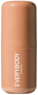 Kremowy bronzer w sztyfcie Everybody London Light, brzoskwiniowy, z widocznym napisem, pionowo, widok z przodu.