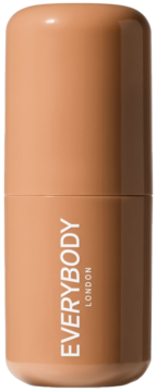 Kremowy bronzer w sztyfcie Everybody London Light-Medium. Gładki, cylindryczny, dwukolorowy ciepły brąz, widok pionowy.