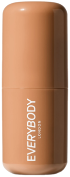 Kremowy bronzer w sztyfcie Everybody London Light-Medium. Gładki, cylindryczny, dwukolorowy ciepły brąz, widok pionowy.