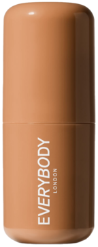 Everybody London kremowy bronzer w sztyfcie Medium, beżowy, cylindryczny pojemnik z logo, widok z przodu.