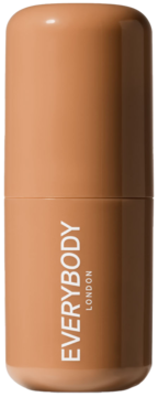 Everybody London kremowy bronzer w sztyfcie Medium, beżowy, cylindryczny pojemnik z logo, widok z przodu.