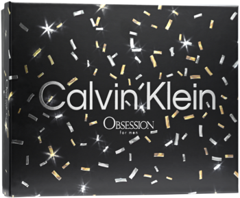 Calvin Klein Obsession męski zestaw w czarnym pudełku, z błyszczącym logo i rozsypanymi złotymi konfetti.
