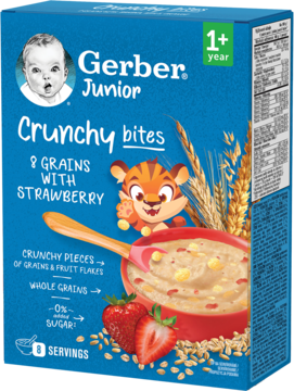 Niebieskie pudełko kaszki Gerber Junior Crunchy Bites 8 zbóż z truskawką (1+), z miską i ziarnami, widok z przodu.