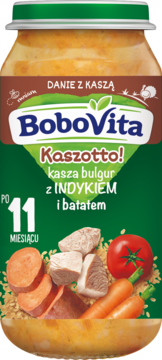 Słoik BoboVita Kaszotto po 11 miesiącu, bulgur z indykiem i batatem, widok z przodu, zielona etykieta z ilustracjami.