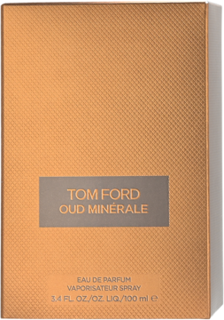 Tom Ford Oud Minérale Eau de Parfum, przednie ujęcie. Złoto-brązowe, teksturowane pudełko perfum z ciemną etykietą.