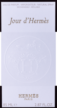 Hermes Jour d'Hermès EDP 85 ml, białe, tłoczone opakowanie z z przodu, z emblematem i złotym napisem.