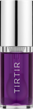 TIRTIR My Glow Lavender Lip Oil, fioletowy olejek do ust w cylindrycznej butelce z metaliczną srebrną zakrętką, widok z przodu.