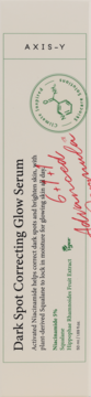 Serum Axis-Y Dark Spot Correcting Glow z 5% niacynamidem i skwalanem, beżowe opakowanie, widok z przodu.