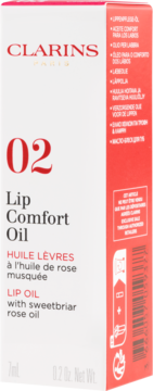 Białe pudełko Clarins Lip Comfort Oil 02 z olejkiem z dzikiej róży, widok z przodu i boku, czerwone napisy.