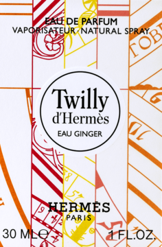 Hermès Twilly d'Hermès Eau Ginger, woda perfumowana. Białe opakowanie z czerwono-żółtym wzorem, widok z przodu.