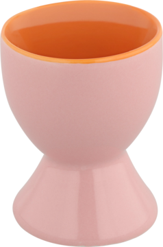 Pastelowy, różowy kieliszek na jajko ceramiczny z pomarańczowym wnętrzem. Gładki, błyszczący, widok z przodu.