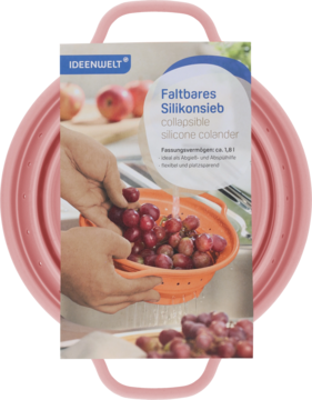 Różowy, składany durszlak silikonowy Ideenwelt, widoczny w złożonej formie, z etykietą pokazującą jego użycie.