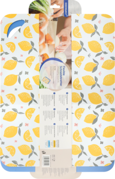 Biała elastyczna deska do krojenia w cytryny i liście, częściowo zakryta opakowaniem z ujęciami zastosowania.