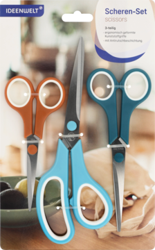 Zestaw trzech nożyczek Ideenwelt: pomarańczowe, turkusowe i niebieskie z białymi uchwytami, widok z przodu.