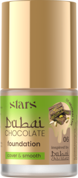 Kryjący podkład Dubai Chocolate 06 Neutral Tan, butelka ze złotą nakrętką, widok z przodu.