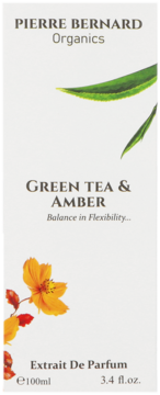 Pierre Bernard Organics Green Tea & Amber Extrait De Parfum 100ml, białe pudełko z zielonymi liśćmi i żółtymi kwiatami.