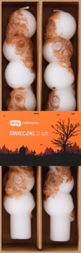 Dwie białe halloweenowe świeczki-czaszki ze złotymi detalami, 2 szt. w brązowym pudełku z pomarańczowym banerem.