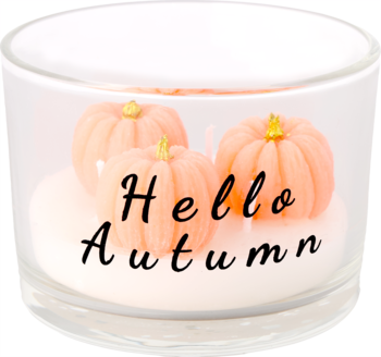 Eloy świeczka parafinowa: trzy jasnopomarańczowe dynie w szklanym naczyniu, napis 'Hello Autumn', widok z przodu.