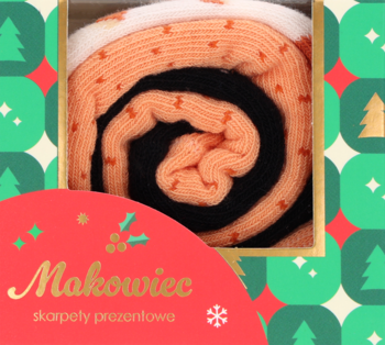 Zrolowane skarpety prezentowe Makowiec w kolorach pomarańczowym i czarnym, z białymi elementami, w opakowaniu na świątecznym tle.