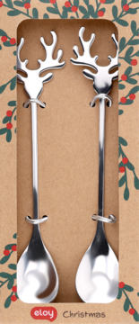 Dwie srebrne świąteczne łyżeczki z uchwytami w kształcie głów reniferów, w brązowym pudełku z motywem ostrokrzewu.