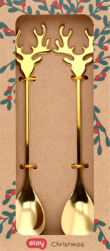 Dwie złote łyżeczki koktajlowe z uchwytami w kształcie poroża renifera w świątecznym pudełku Eloy z motywem ostrokrzewu.