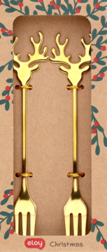 Dwa złote widelczyki deserowe z uchwytami renifera, w świątecznym kartonie Eloy z wzorem ostrokrzewu, widok z przodu.