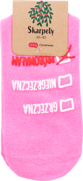 Różowe skarpetki świąteczne z metką. Na skarpetach lista z opcją "NIE PRÓBOWAŁAM" zaznaczoną znakiem X.