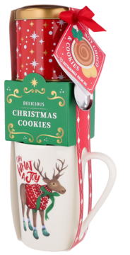 Świąteczny zestaw: kubek z reniferem, zielone pudełko ciasteczek i puszka waniliowej czekolady do picia.