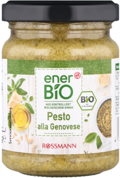 Szklany słoik zielonego enerBIO Pesto alla Genovese z czarną nakrętką. Etykieta z napisem BIO i motywem bazylii. Widok z przodu.