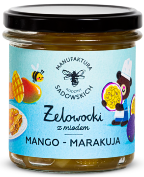 Żelowocki z miodem Mango-Marakuja Manufaktury Sadowskich. Przejrzysty słoik z niebieską etykietą, misiem i owocami.