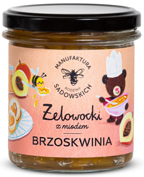 Słoik Żelowocki Brzoskwinia z miodem, Manufaktura Rodziny Sadowskich, etykieta z misiem kucharzem i pszczołą, widok z przodu.