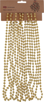 Złote, błyszczące koraliki w długich sznurach, ekspozycja na brązowej kartonowej zawieszce z motywem świątecznym jemioły.