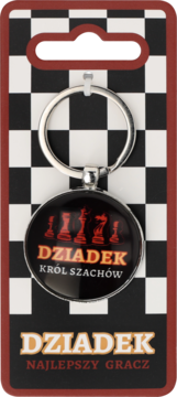 Brelok "Dziadek Król Szachów" w opakowaniu z szachownicą i napisem "Dziadek Najlepszy Gracz".