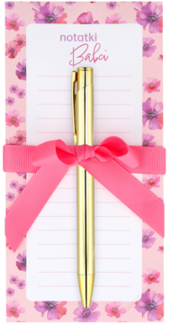 Różowy zestaw notatnik i złoty długopis dla Babi, z kwiatowym wzorem i kokardą, widok z góry.