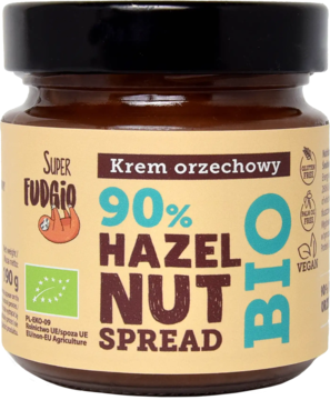 Super Fudgio Bio krem orzechowy 90% orzechów laskowych w szklanym słoiku, widok z przodu.