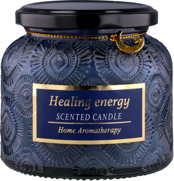 Granatowa świeca zapachowa "Healing energy" w szklanym słoiku z reliefowym wzorem i złotym księżycem.